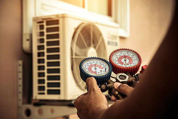 Professional Ductwork Repair technician working in Putnam, CT
